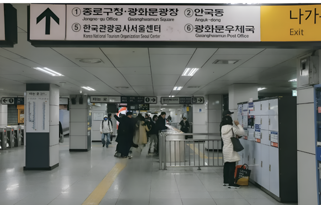 Korean subway exit sign showing numbered exits and nearby landmarks