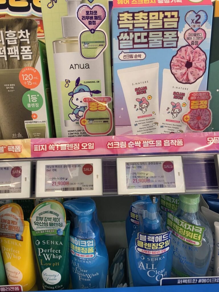 Two Olive Young price labels side by side, both 21,900 won but with different per-10ml unit prices